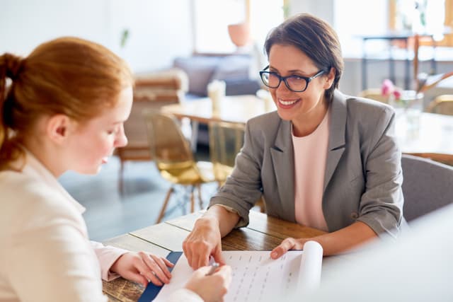 2 people in a meeting